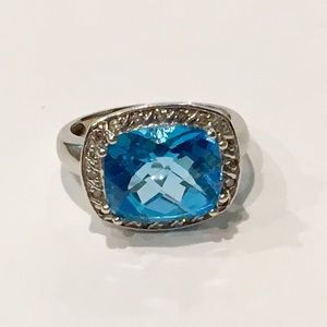 Blue topaz and diamond ring